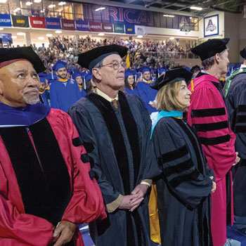 Professors in cap and gowns